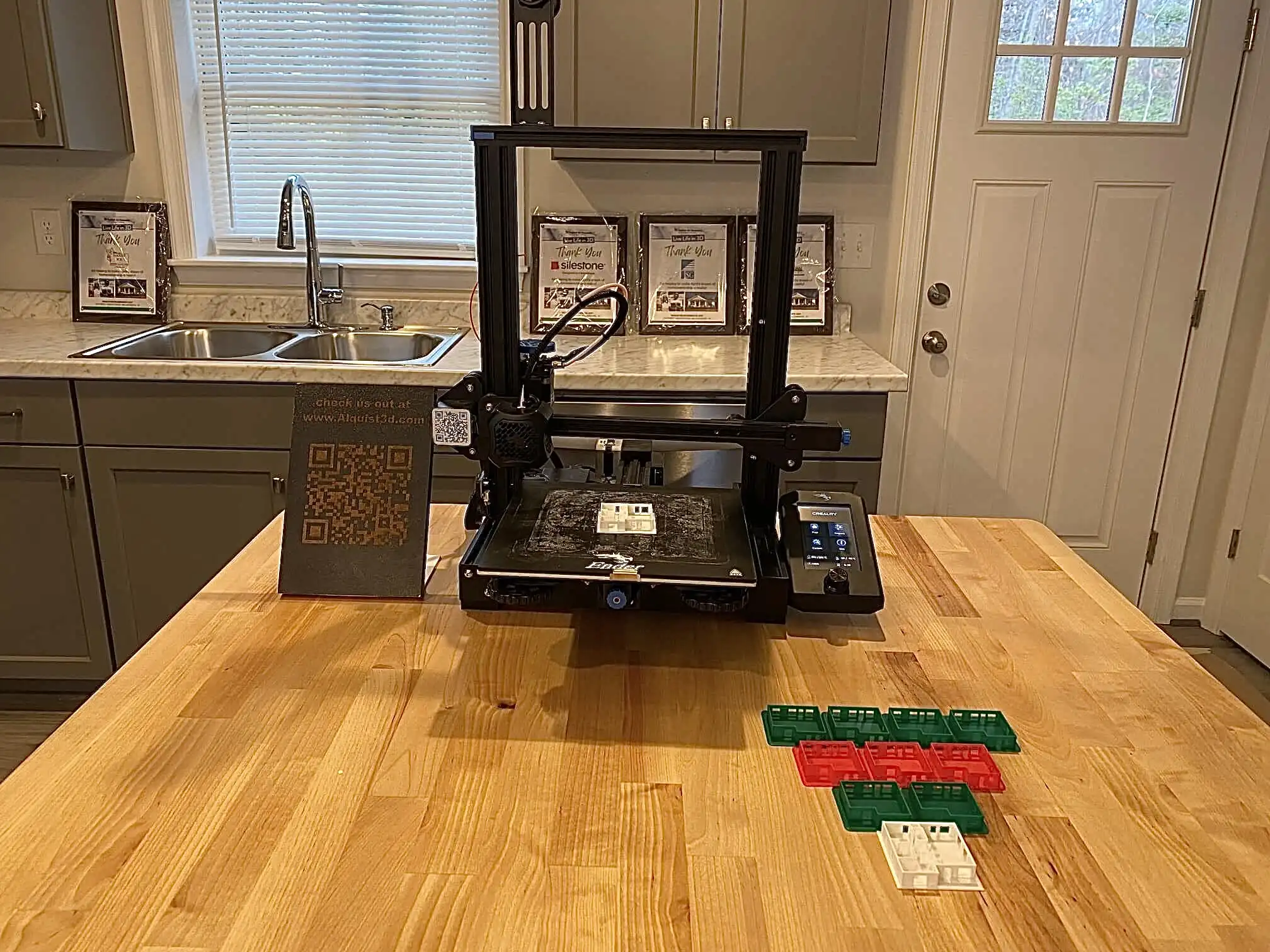 A countertop 3D printer for creating knobs, light switches, and other replacement parts comes with the home. (Courtesy of Alquist)